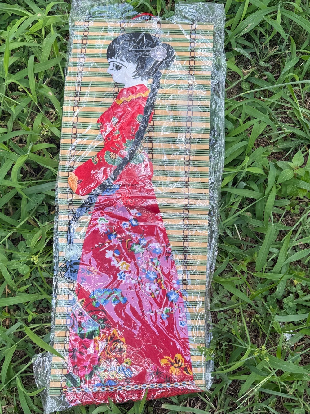 vintage Chinese fabric appliqué and slat bamboo wall hanging